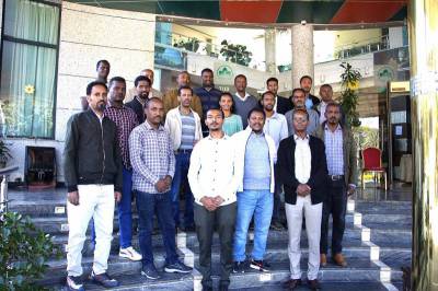 Group photo of participants of module review and validation workshop