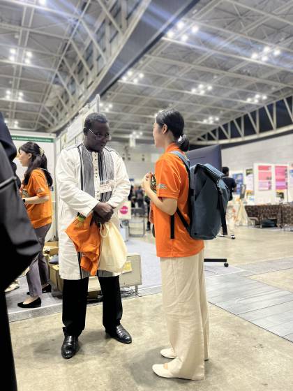 Ms. N, an intern, speaking with SAA staff.