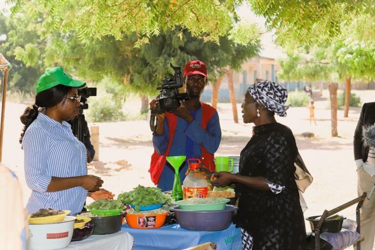 Mrs Okla (Right in Black attire) presented some value addition products during a visit by SAA to Daban Fulani Community